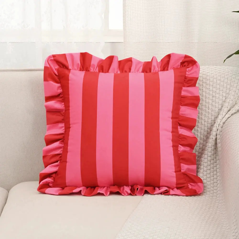 Striped velvet pillowcase with pink and red vertical stripes, 18x18 inches, ruffled edges.