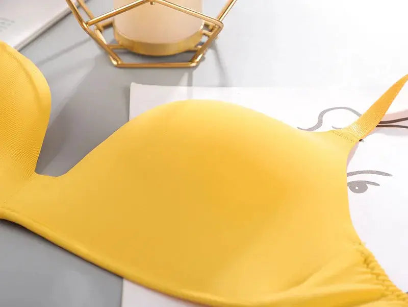 Bra yellow seamless wire-free for women with breathable cups.