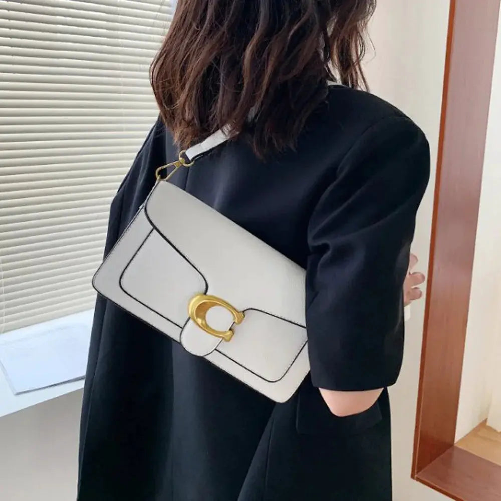 Double-Strap Small Square Crossbody Bag in white with black trim and gold hardware