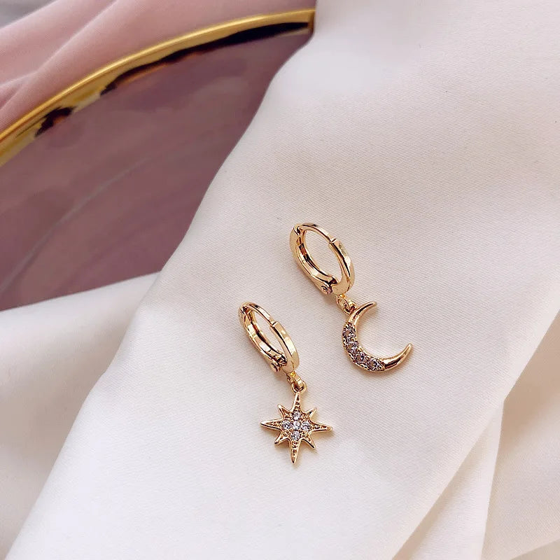 Gold-tone asymmetric star and crescent moon dangle earrings, set of 2