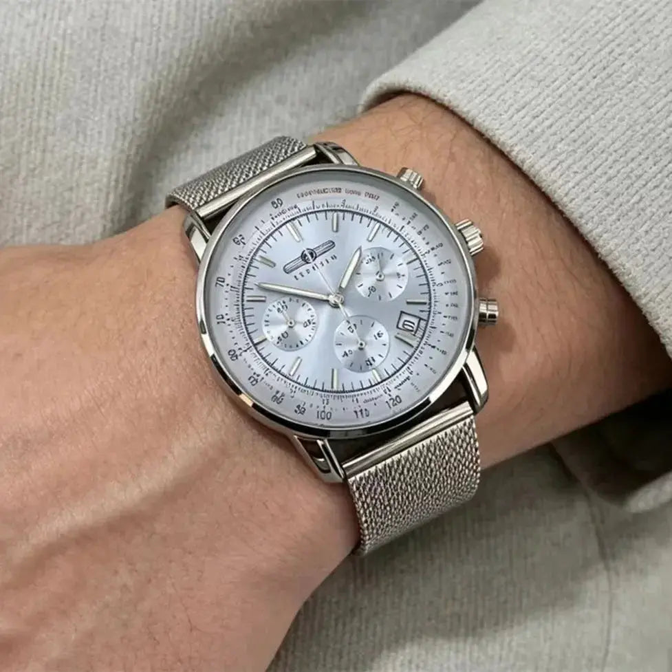 Men's silver chronograph watch with mesh stainless steel band, three subdials and date window by Simples Market