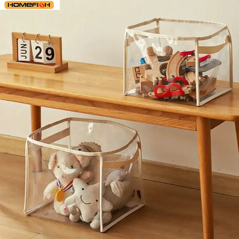 Homefish transparent toy storage boxes with white trim; 2 clear, large-capacity bins on a wooden table with plush toys.