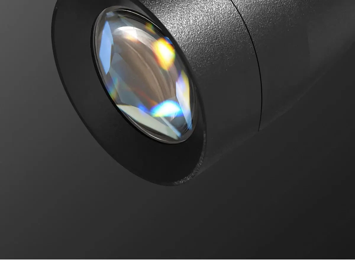LED spotlight, black, surface-mounted ceiling fixture with zoomable lens.