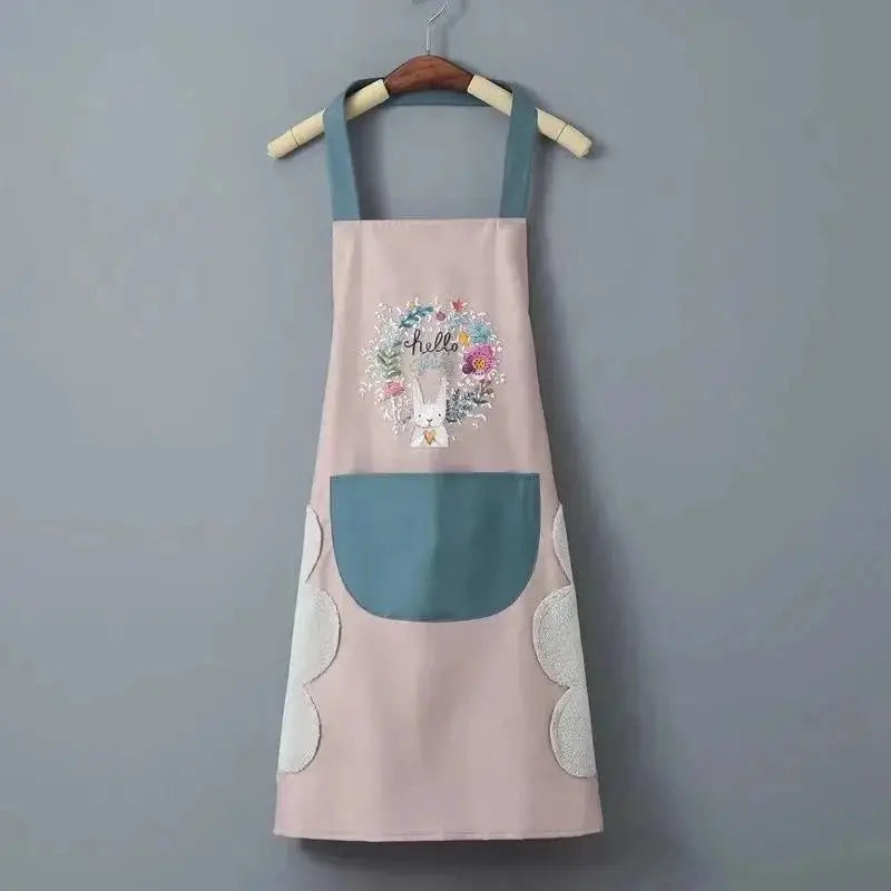 Women's rabbit-print kitchen apron in pink with blue neck straps and blue front pocket