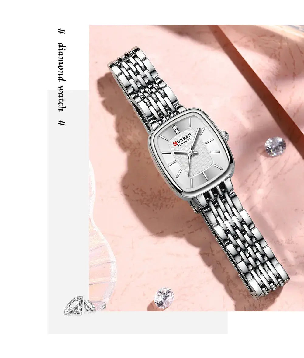 CURRN 9093 women's quartz watch, silver-tone stainless steel bracelet with diamond markers.