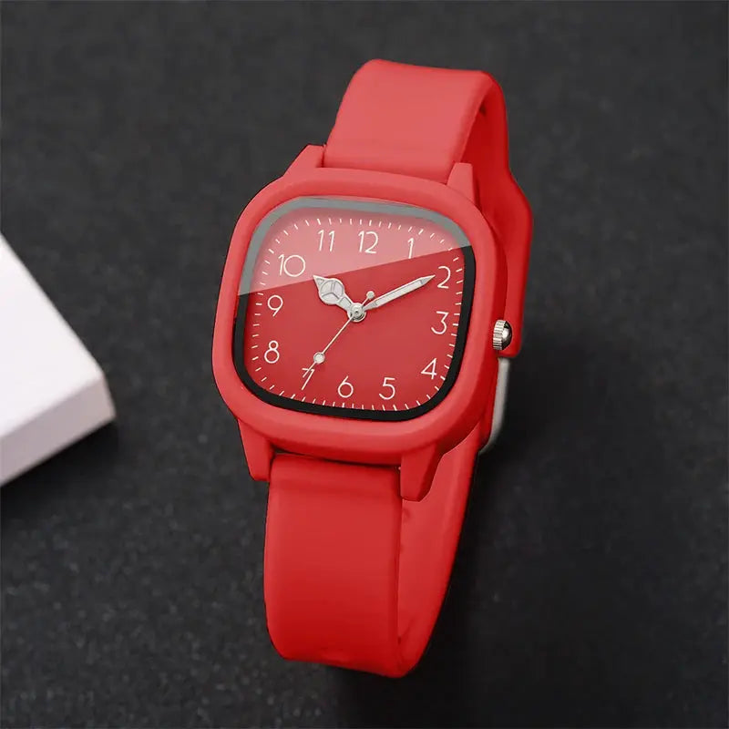 Silicone-band red women's wristwatch with a square-rounded dial and white Arabic numerals, fashion accessory