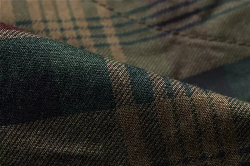 Men's plaid shorts fabric close-up in brown and green by Simples Market