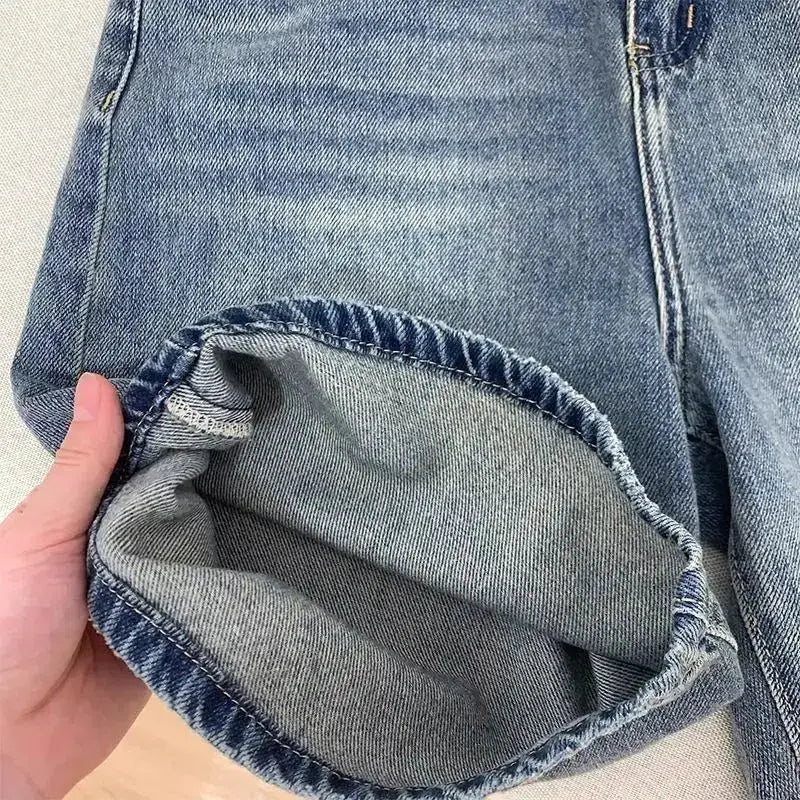 Denim shorts, blue washed with rolled hem, knee-length casual women's shorts