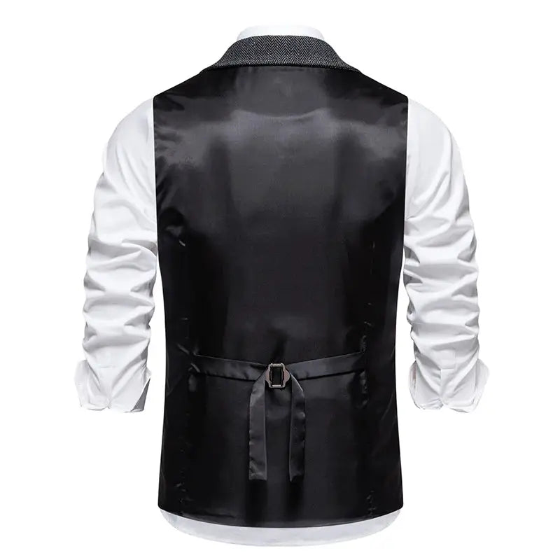 Men's retro lapel suit vest by Simples Market, black satin back with waist belt and white shirt sleeves.