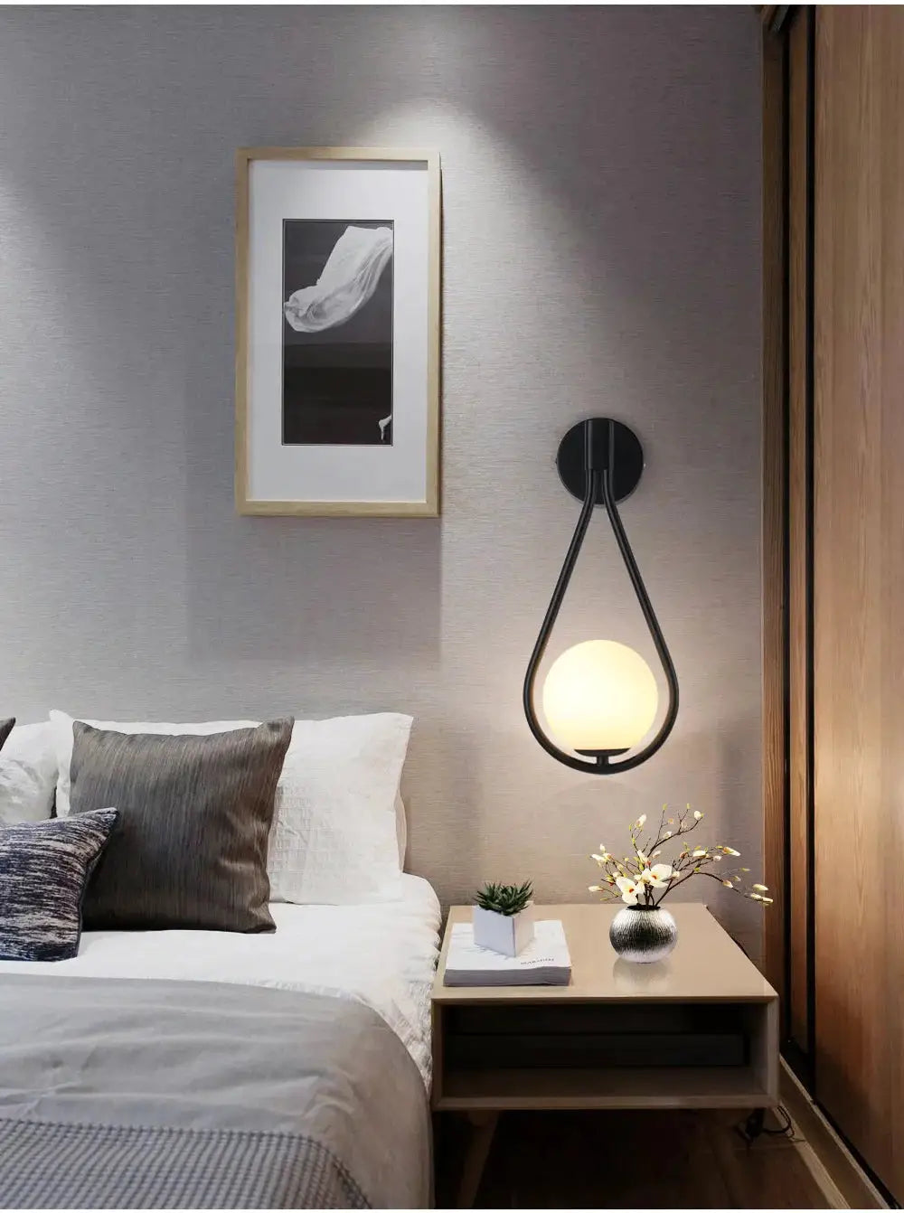 Nordic Creative Luxury Glass Ball LED Wall Lamp with black metal teardrop frame and glass globe, bedside wall light.