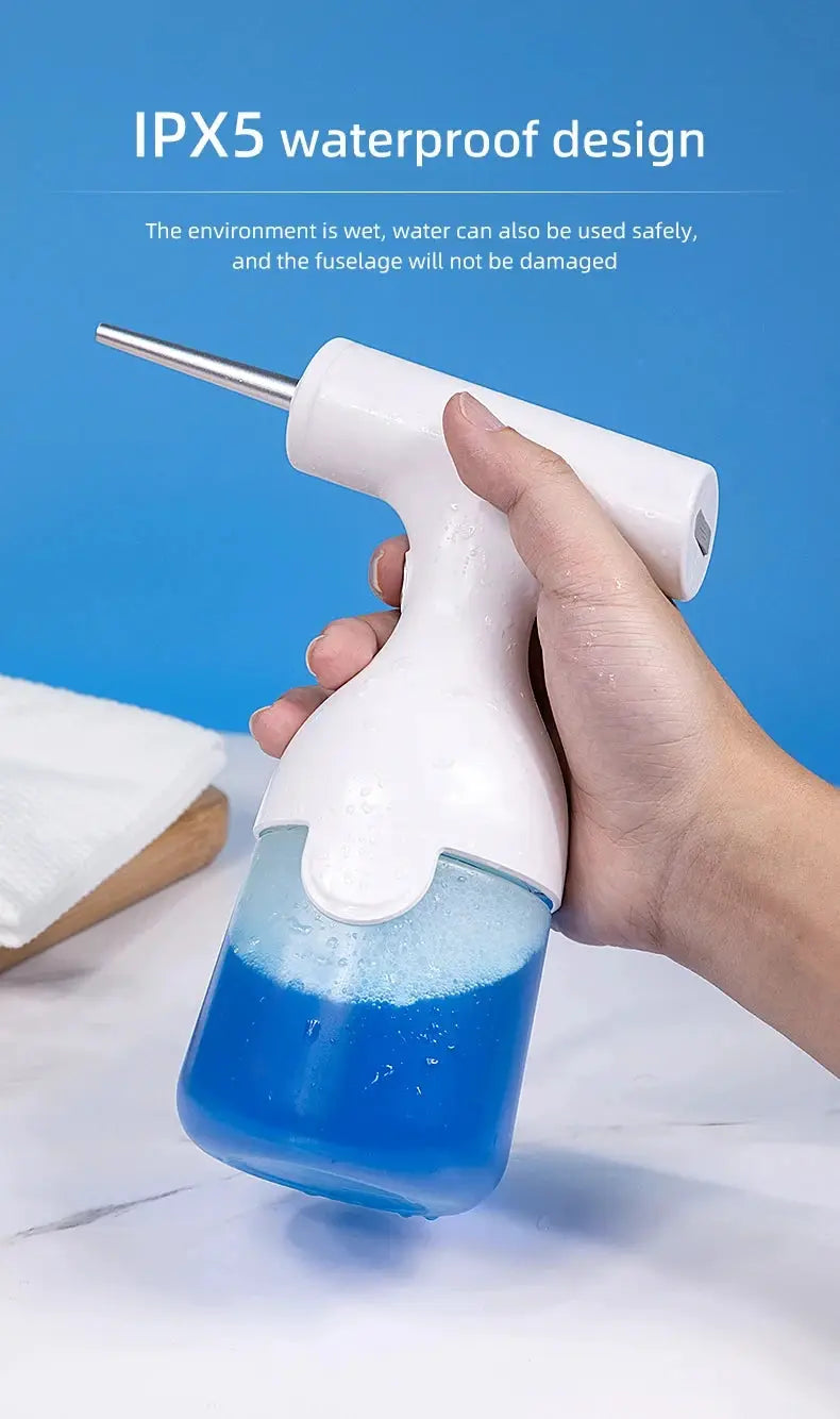 HOMEFISH electric foam dispenser gun by Simples Market; white plastic handle with blue liquid and metal nozzle