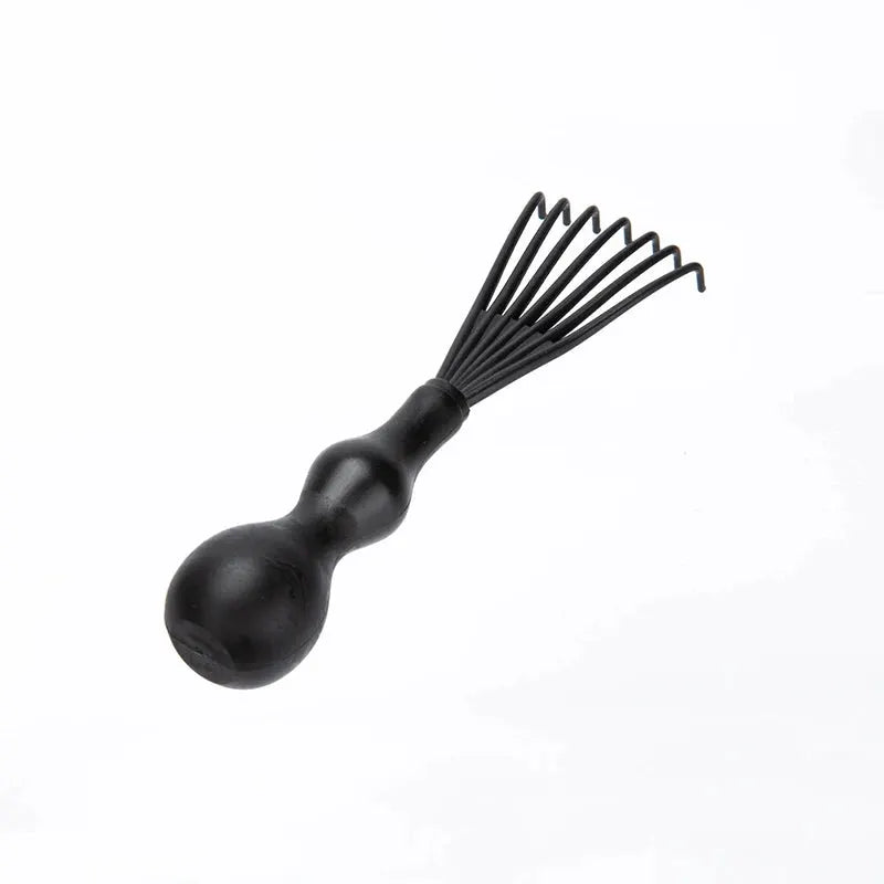 Magic Detangling Hairbrush with black handle and flexible prongs for gentle grooming