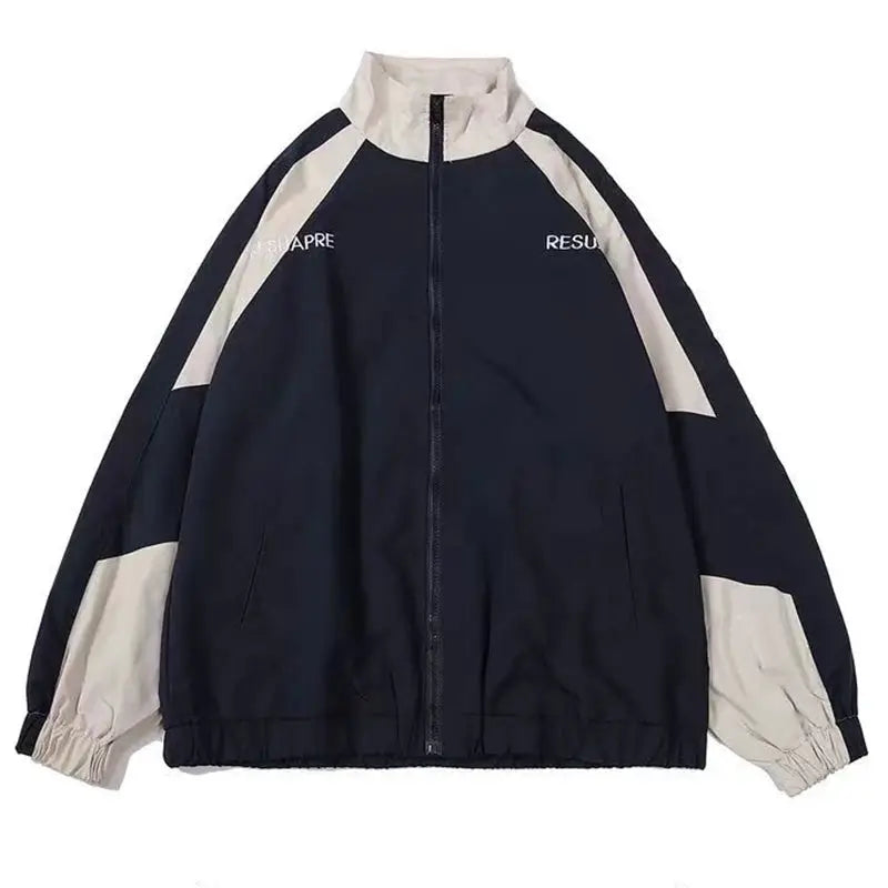Simples Market hip hop varsity windbreaker jacket in black with beige color-block sleeves, zip front.