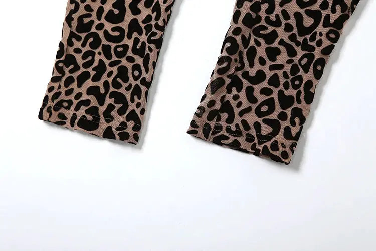 Kliou Midnight Y2K leopard print jumpsuit for women, brown and black animal-print fabric on pant legs.