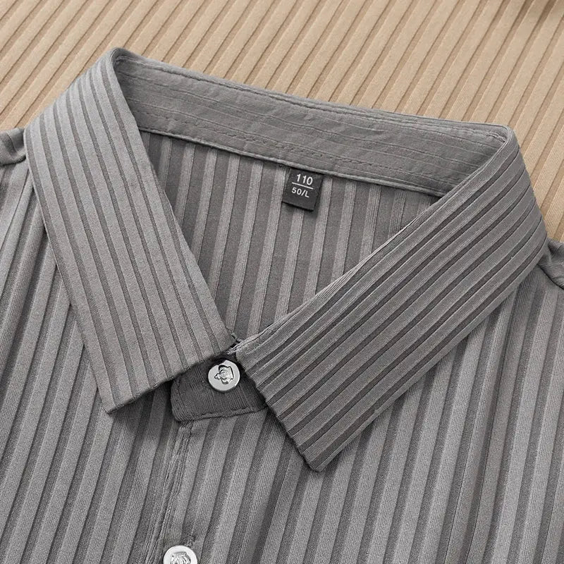 Men's grey striped polo shirt with collar and buttons, short sleeves.