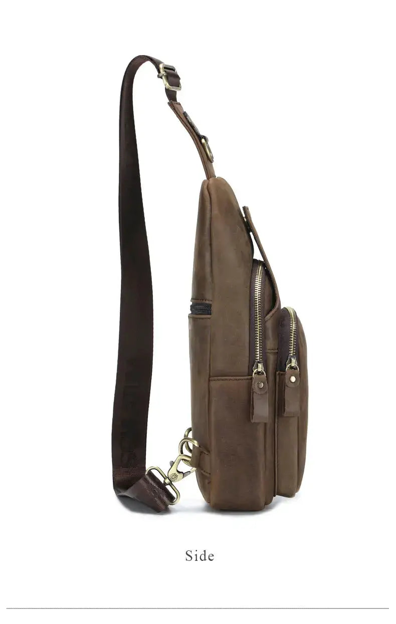 Simples Market SCHLATUM brown genuine leather chest bag with triangle crossbody design and dual zip pockets.