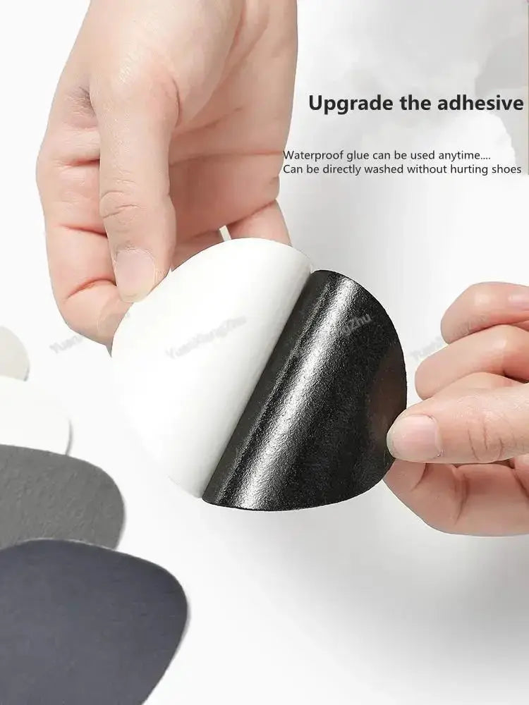 Sports shoe patches for heel repair; adhesive black vinyl heel protector patches for sneakers by Simples Market.
