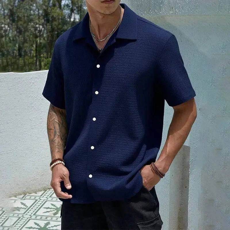 Men's navy blue short-sleeve button-up shirt by Simples Market, baggy streetwear fit.