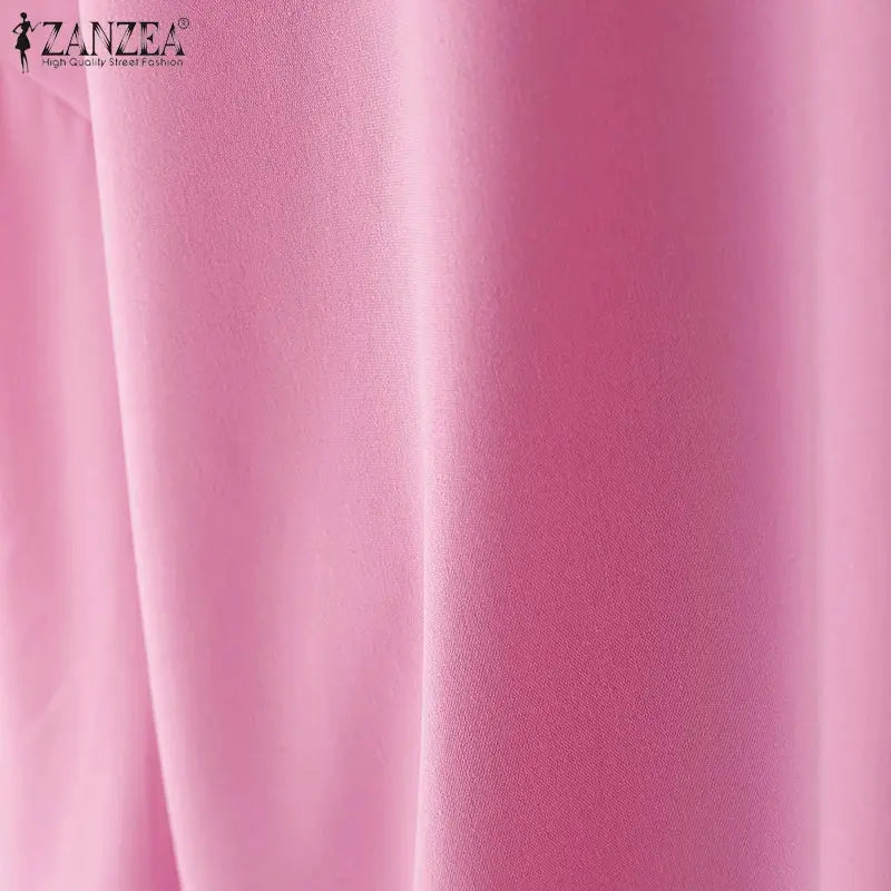 ZANZEA blouse fabric close-up in pink with visible logo