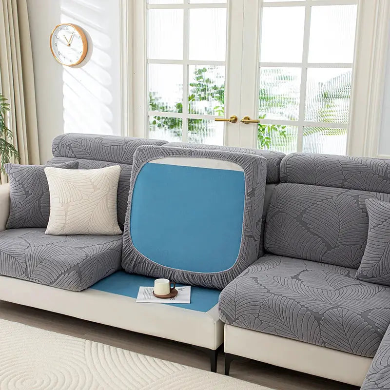 Sofa cushion cover by Simples Market, thick plush gray elastic cover with blue insert on a sectional