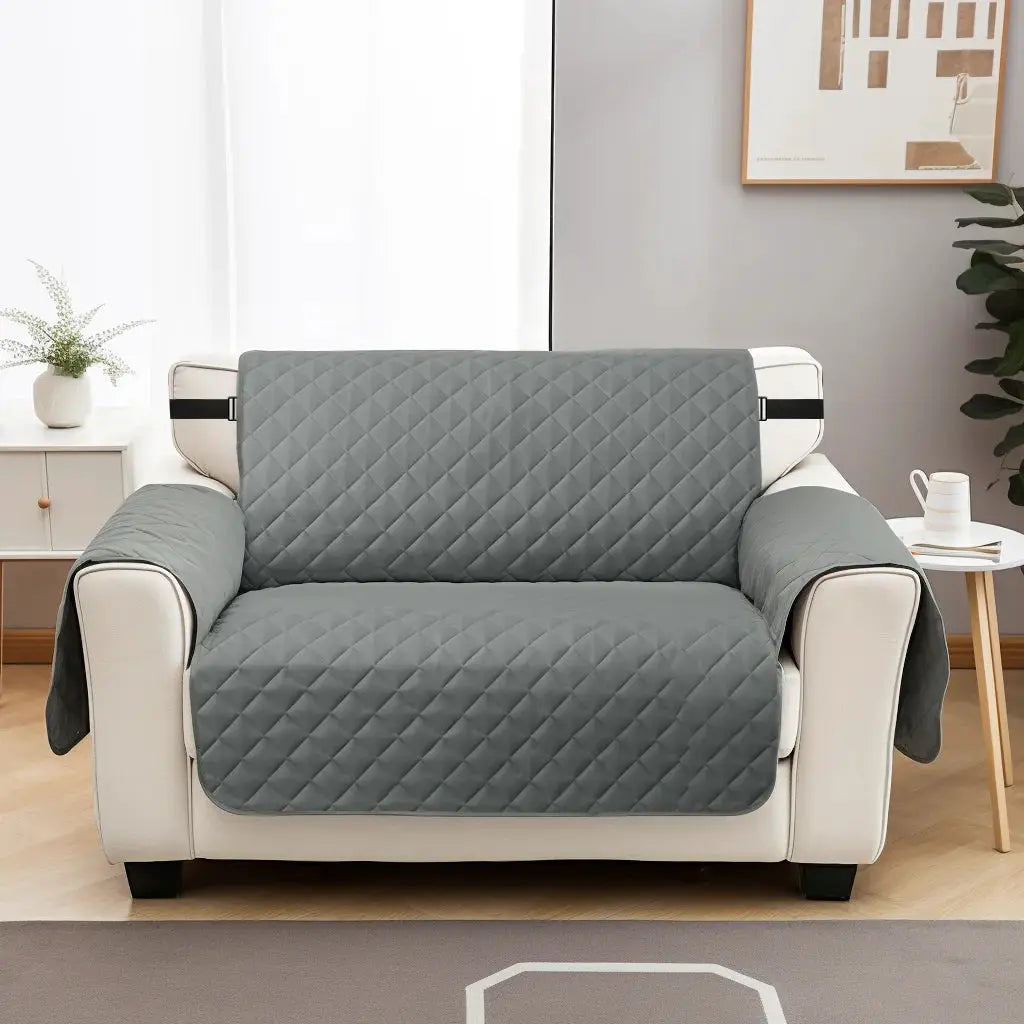 Simples Market gray quilted sofa slipcover with elastic straps