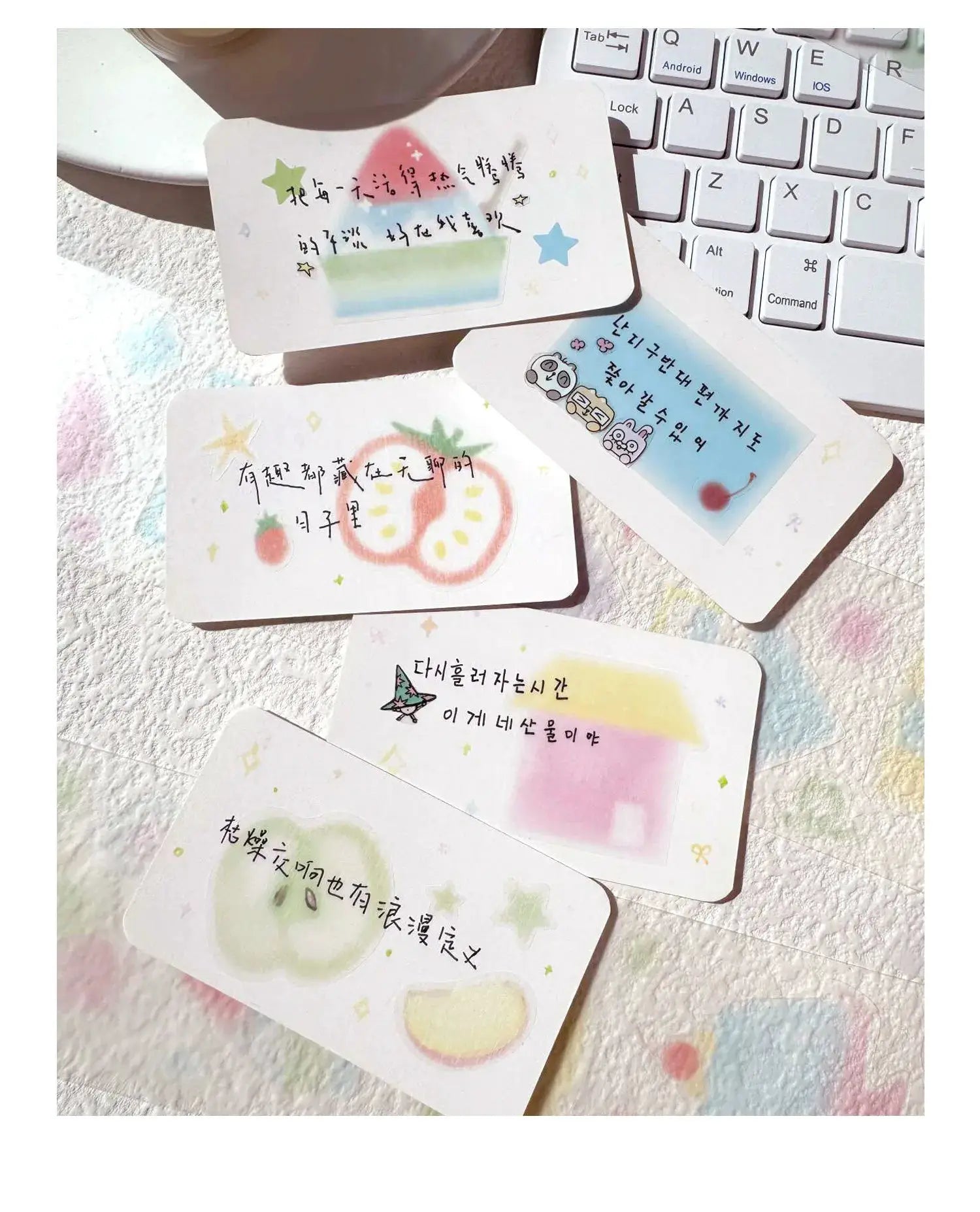 Decorative adhesive tape samples set for journaling in pastel watercolor with fruit and cute characters