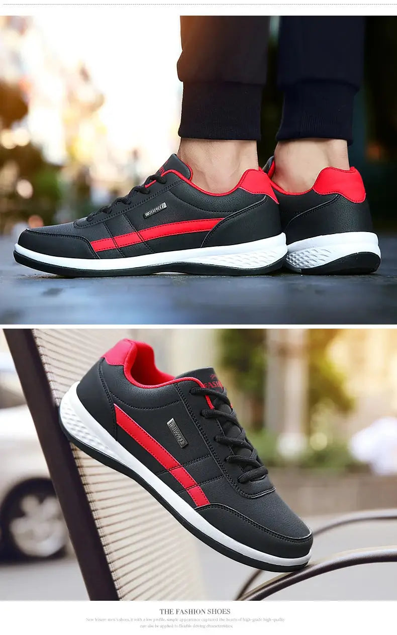 Pair of Simples Market leather men’s sneakers, black with red accents and white sole.
