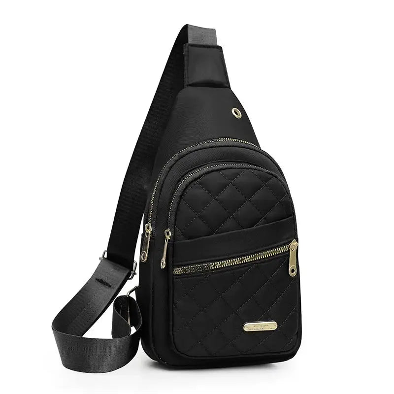 Simples Market black quilted chest bag with gold zippers and front pocket, adjustable strap