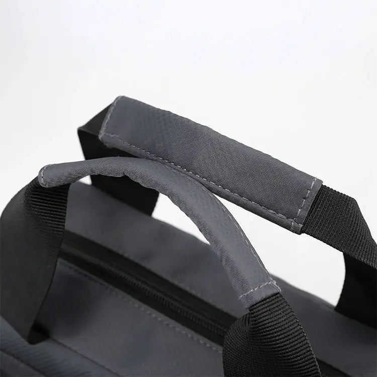 Men's crossbody bag by Simples Market, grey fabric with zip closure and adjustable shoulder strap.