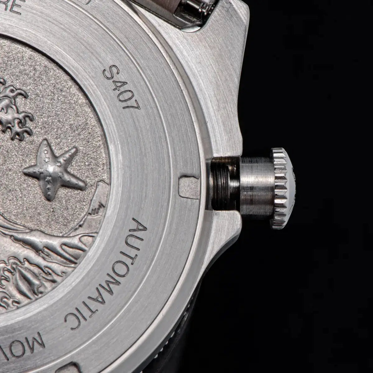 SEESTERN Sub600T diver watch back view; stainless steel case, knurled crown, brushed finish.