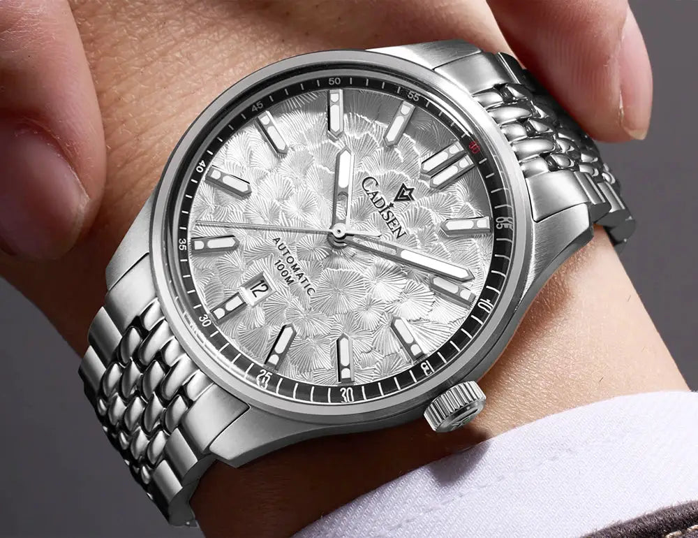 CADISEN automatic men's wristwatch with silver textured dial and stainless steel bracelet.