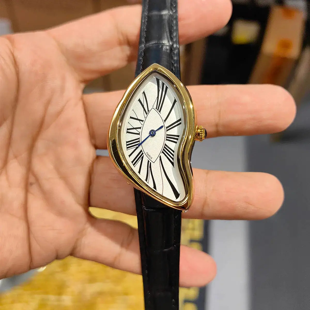 New Alien Crash Melt Twist Y2K watch by Simples Market; gold-tone case, black leather strap