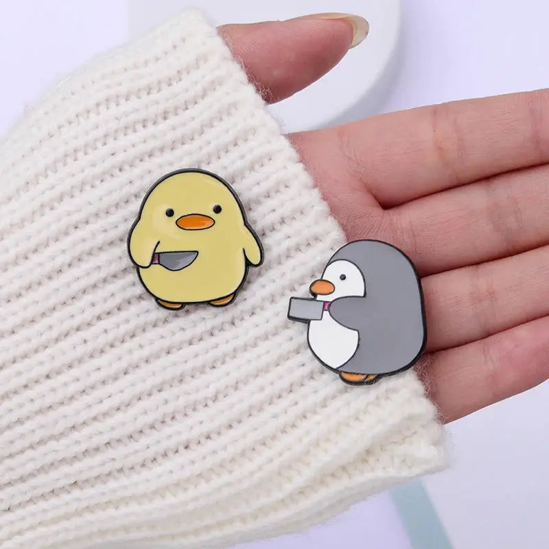 Enamel pin set: 2 cartoon pins, yellow chick and gray penguin with orange beaks