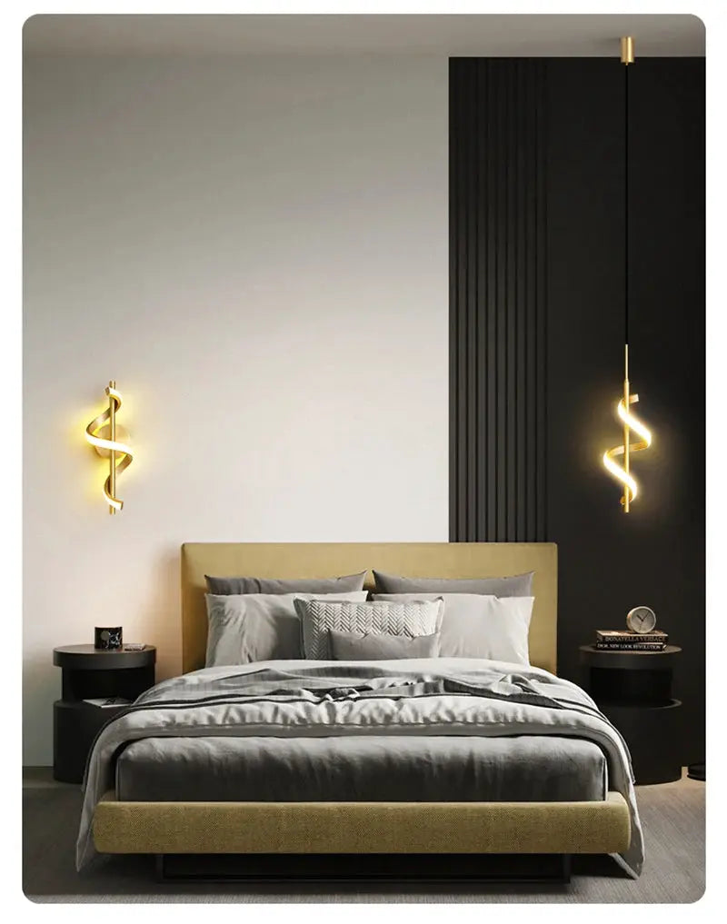 Lustre LED pendant lights in gold spiral finish; two modern bedroom fixtures: ceiling pendant and wall sconce.