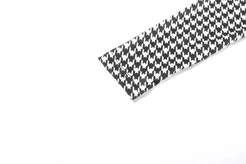 Shestyle fabric swatch in black and white houndstooth pattern