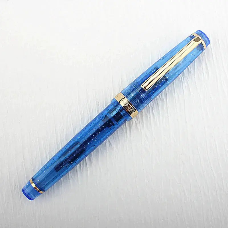 Jinhao 82 blue acrylic fountain pen with gold trim and clip, converter included