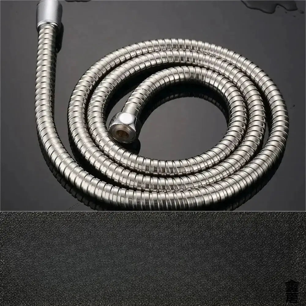 Flexible stainless steel shower hose with chrome finish and metal fittings.