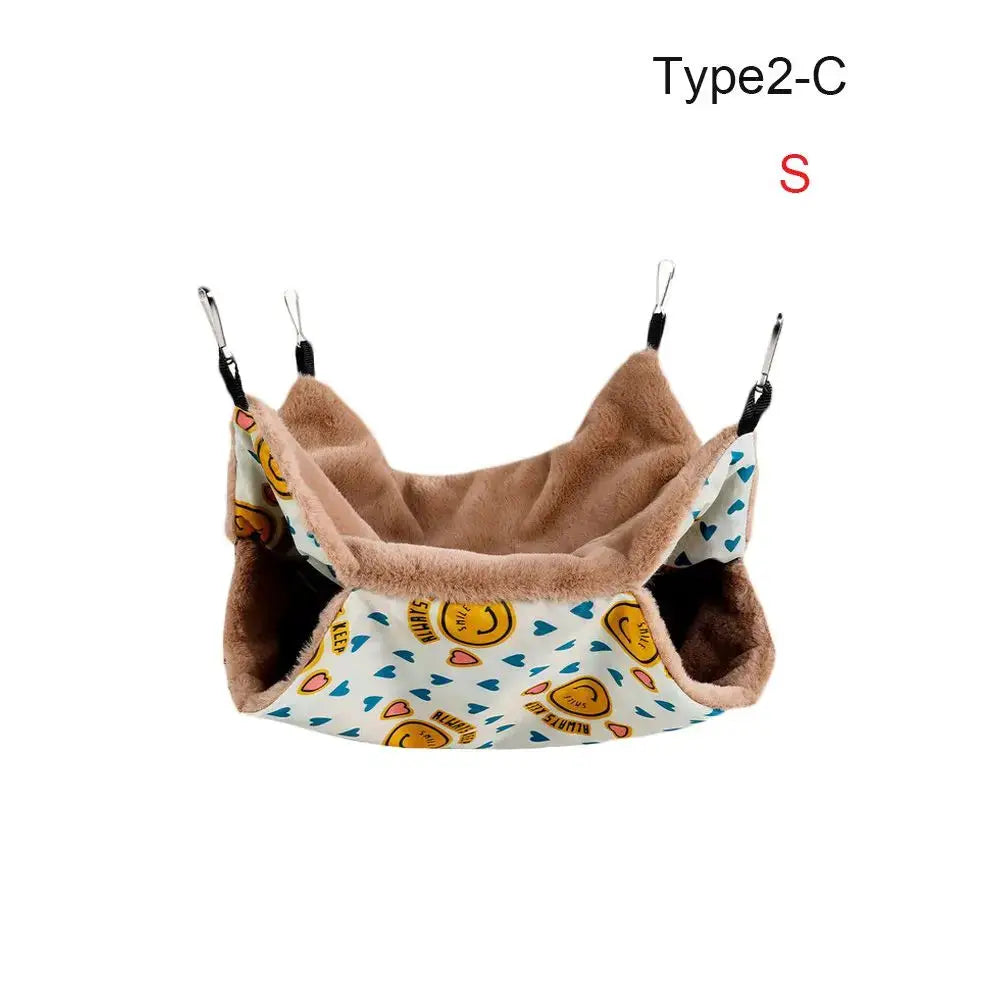 Warm plush hamster hammock, double-layer sleeping bag nest with brown interior and blue outer fabric for hanging cages.