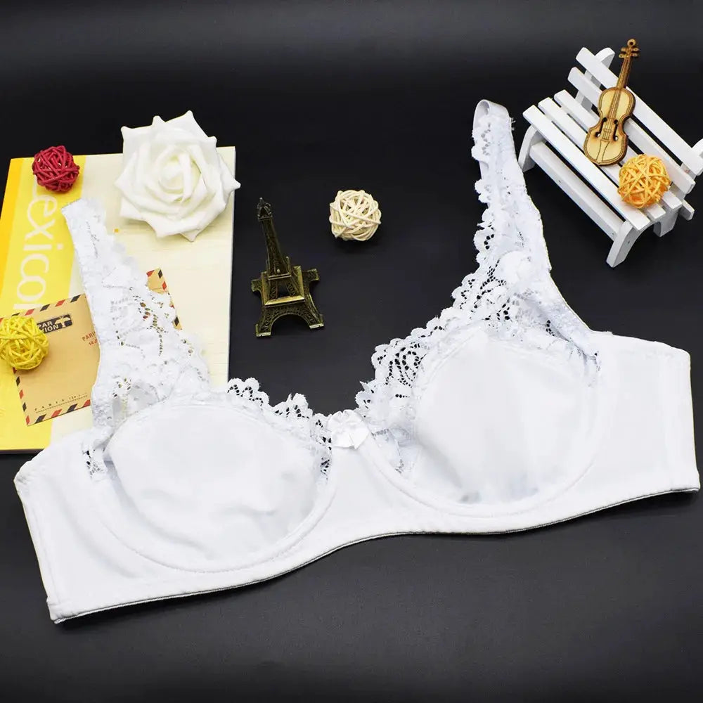 White lace underwire bra with scalloped trim and delicate lace detailing