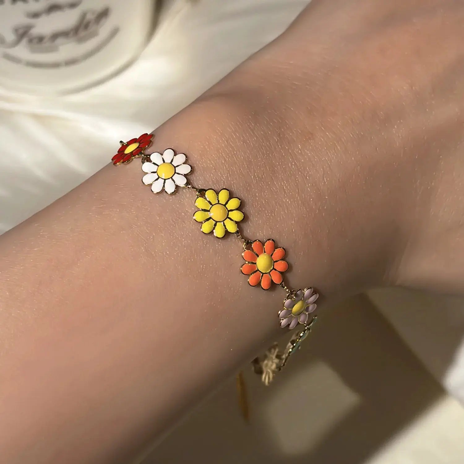 Sweet Daisy Flower Bracelet with multicolor enamel daisies on a delicate gold-tone chain