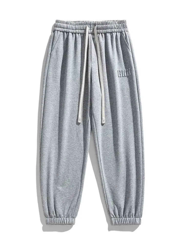 Men's grey cotton-poly jogger pants with drawstring waist and elastic cuffs