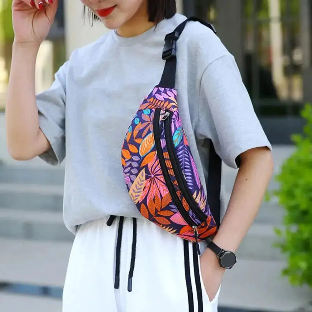 Simples Market sports waist pack with multicolor leaf print, black zipper, crossbody strap