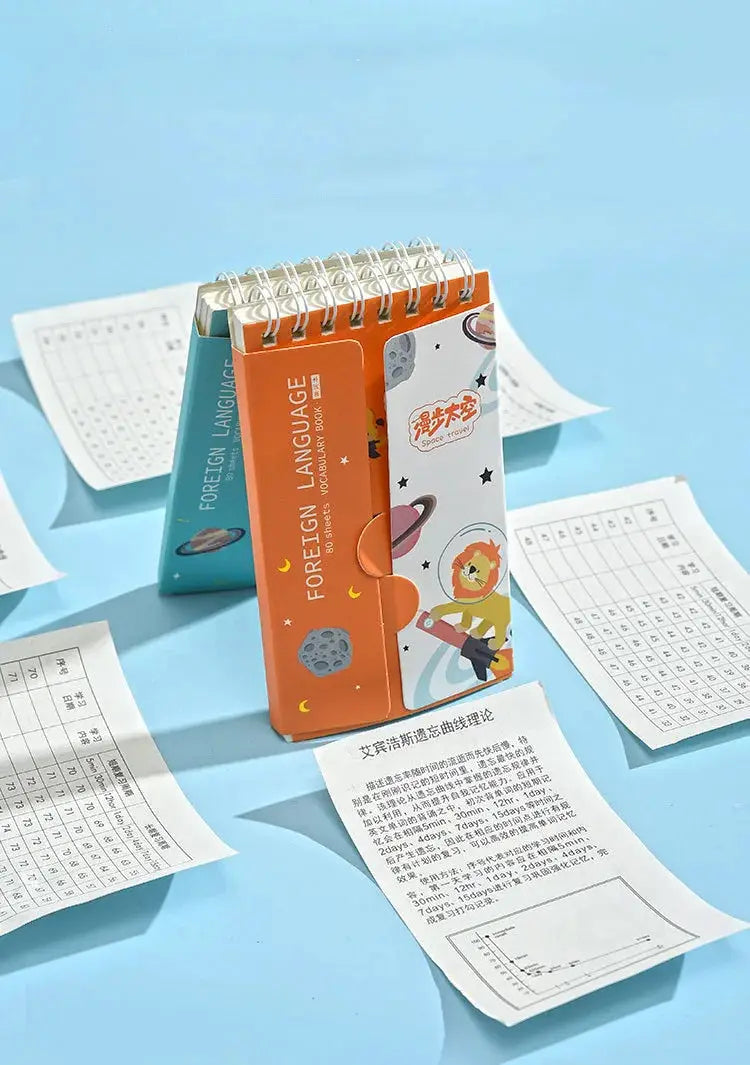 Cute English word notebook set by Simples Market; three spiral-bound portable planners with orange and teal covers.