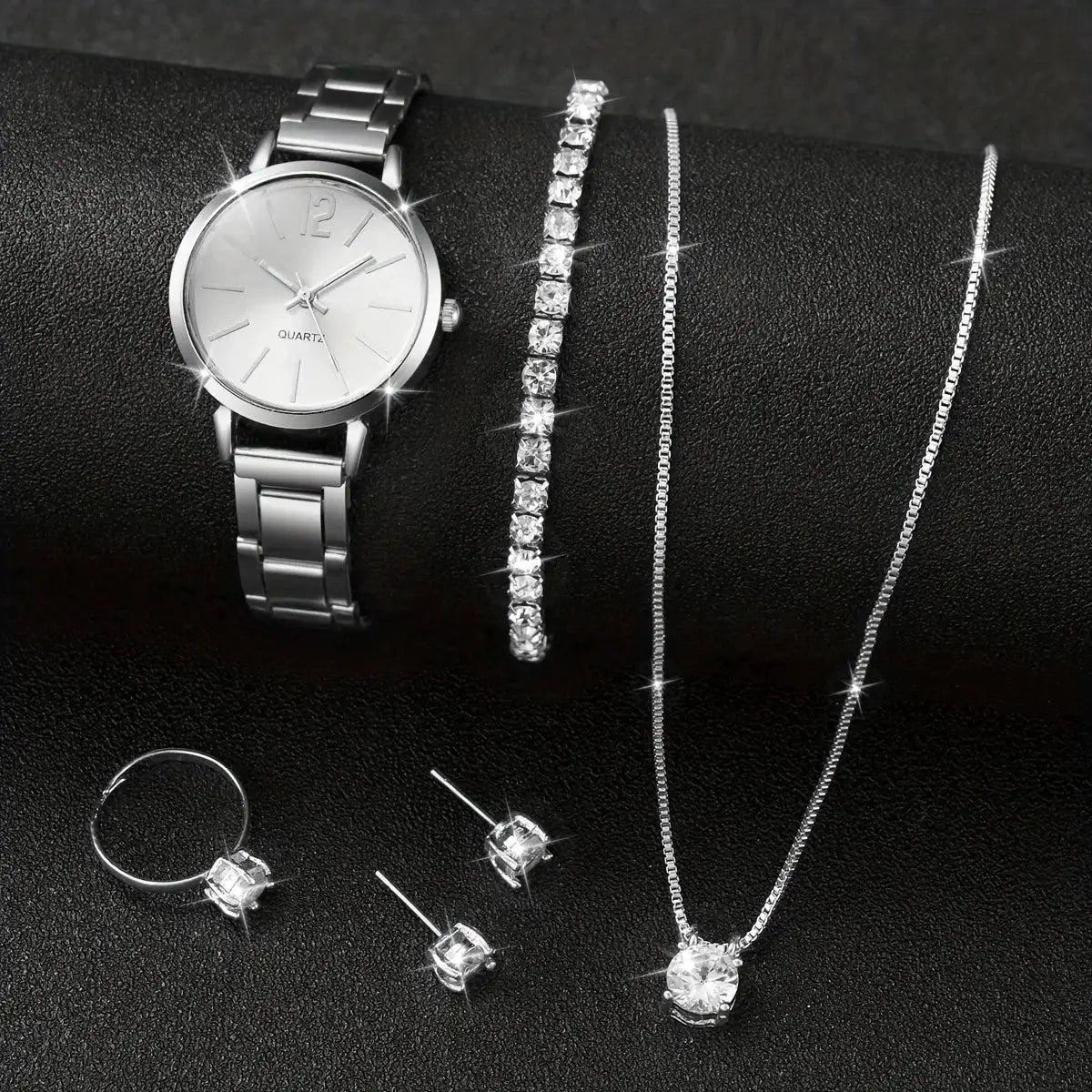 6-piece silver jewelry set: quartz watch with stainless steel band, crystal bracelets, pendant necklace, ring, and studs
