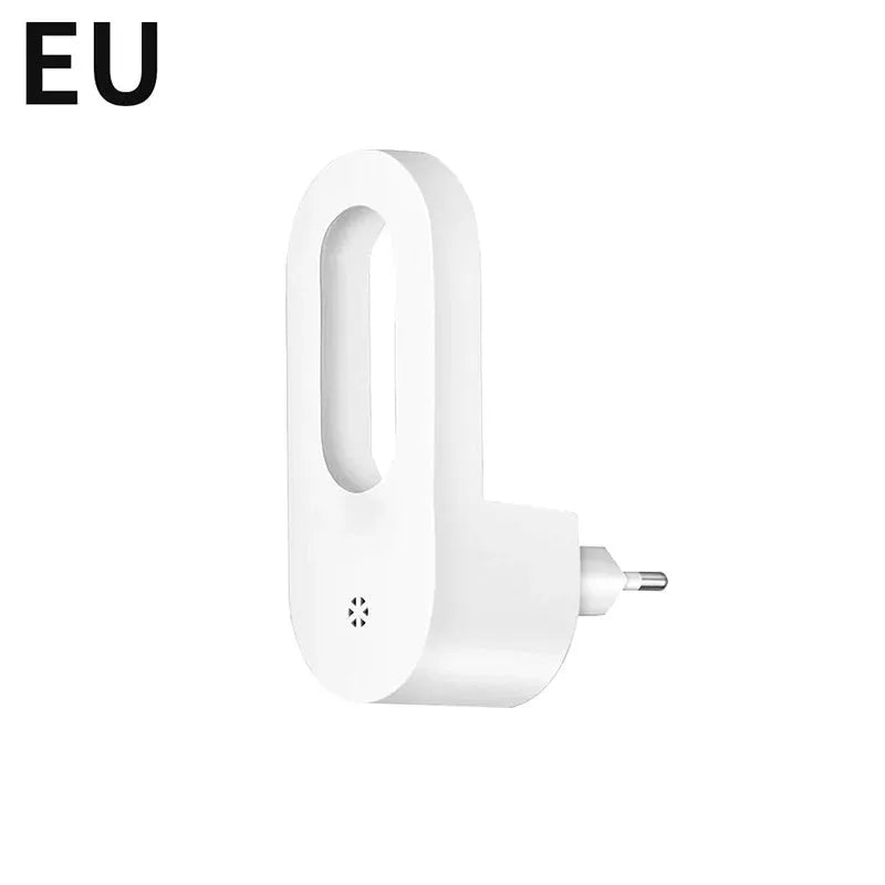 White EU plug wall night light with twilight sensor for energy saving in kids' room.