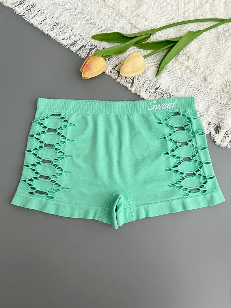 Mint green seamless boxer shorts with side hollow-out mesh panels