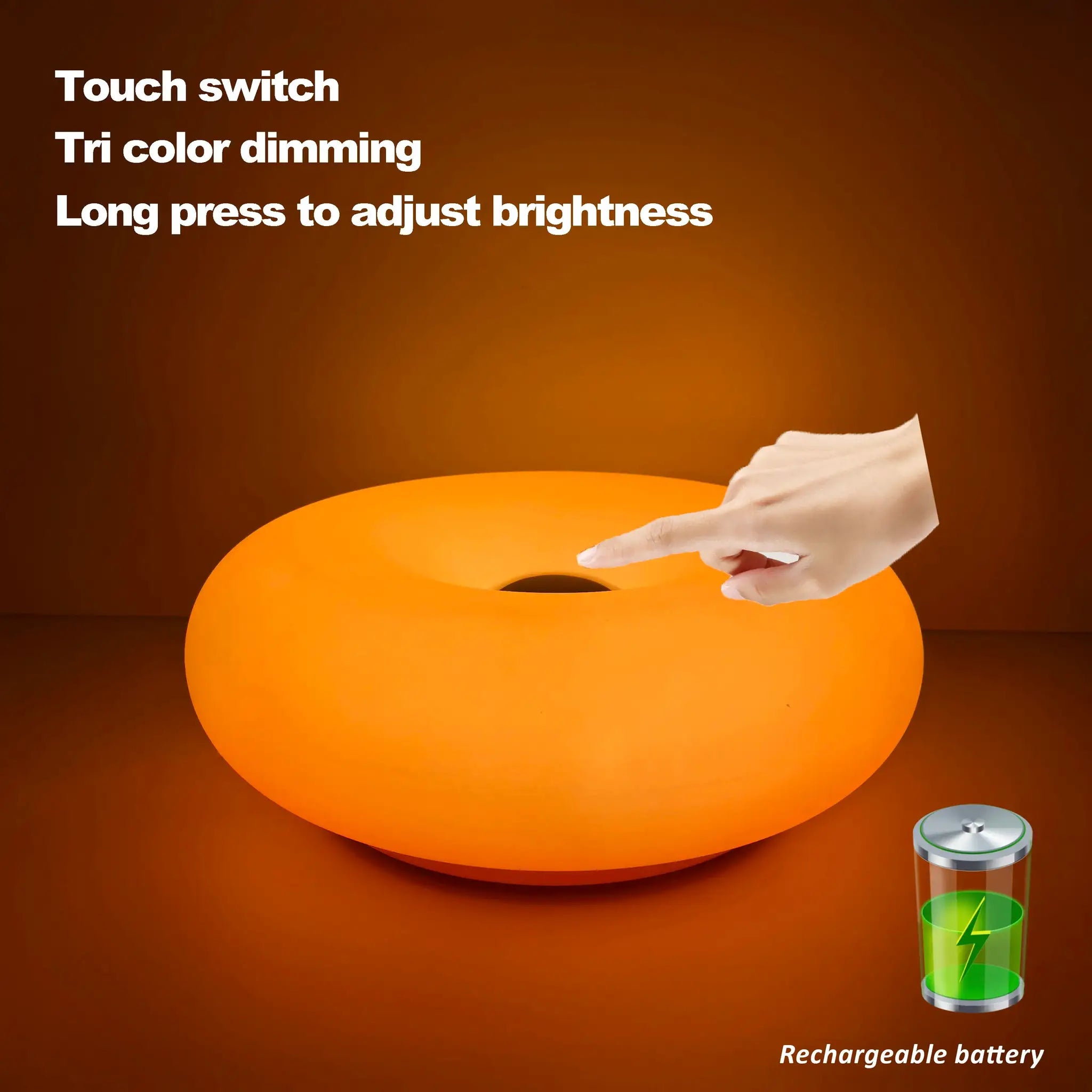 Donut-shaped orange Bauhaus table lamp with rechargeable battery for ambient lighting