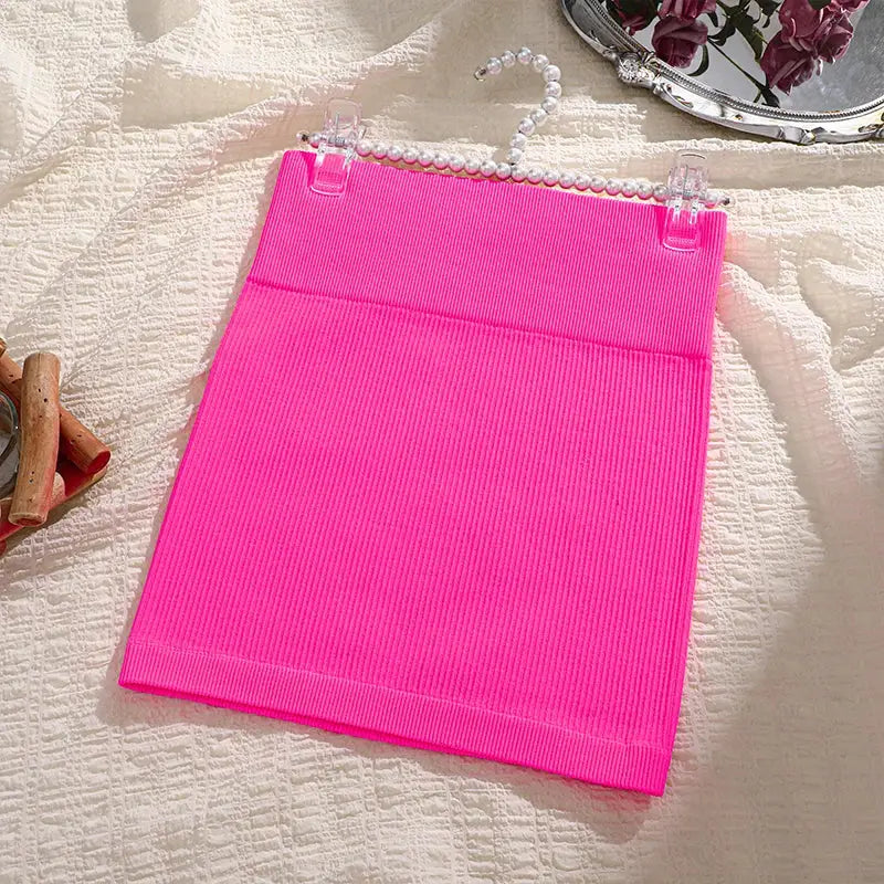 Mini skirt neon pink knitted, high-waist with elastic waistband, sleek body-hugging fit