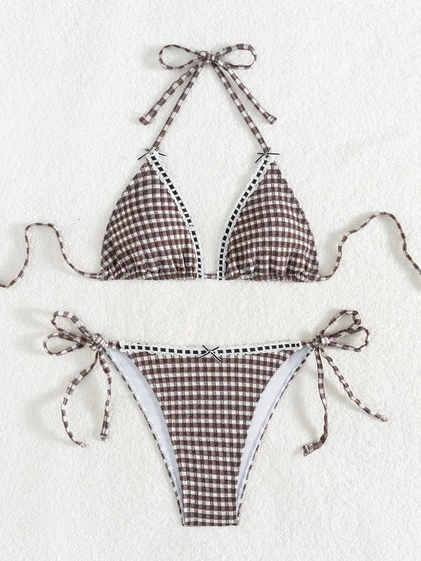 Simples Market 2026 two-piece triangle bikini set in brown gingham with white trim; halter top and tie-side Brazilian bottoms