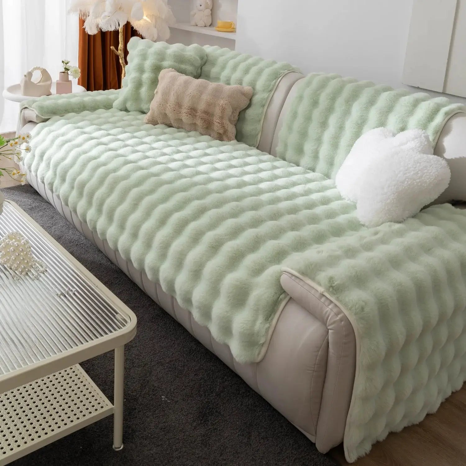 Simples Market thick faux rabbit fur sofa slipcover in mint green with plush cushions on a modern sofa